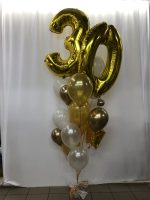 Elegant balloon Bouquet with Number Balloon Inflated With Helium and attached to weight